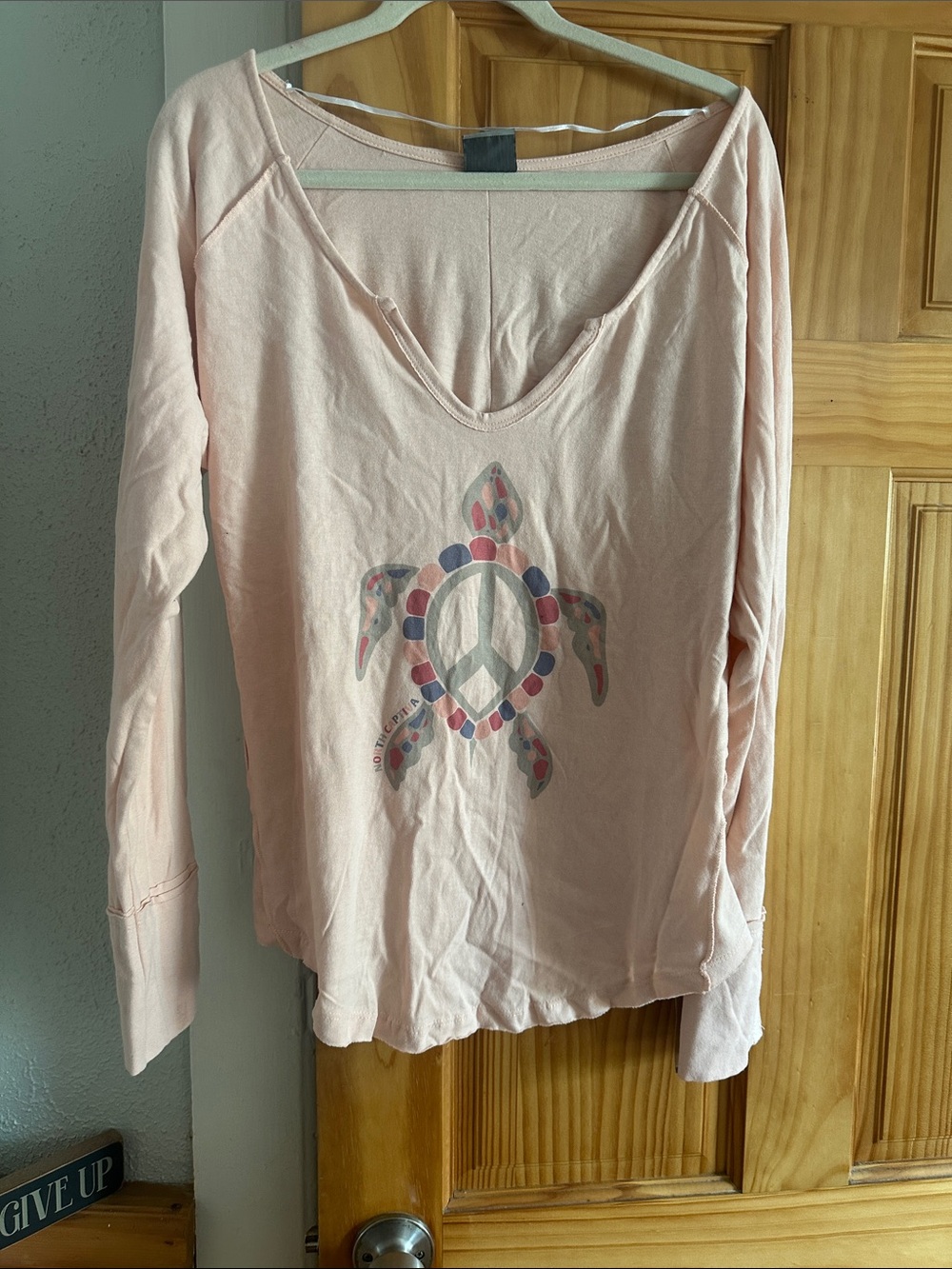 MV Sport Light Pink Long Sleeve V-Neck Top with Turtle Peace Graphic